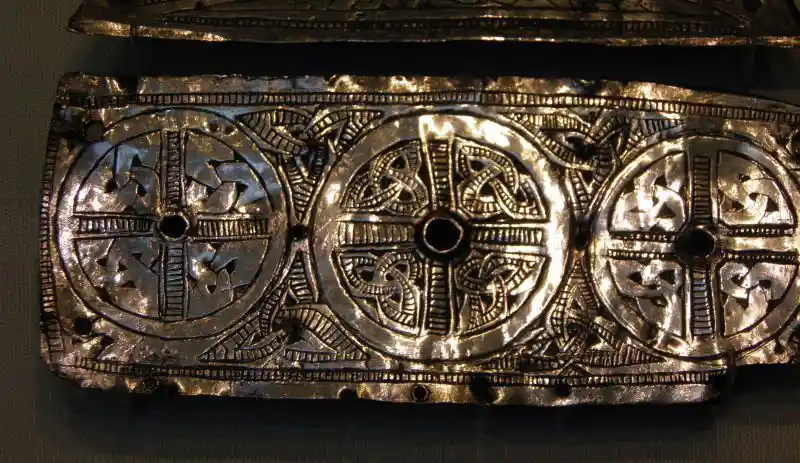 Solar disc on stylistic cross-currents, mix of Anglo-Saxon and Scandinavian art styles